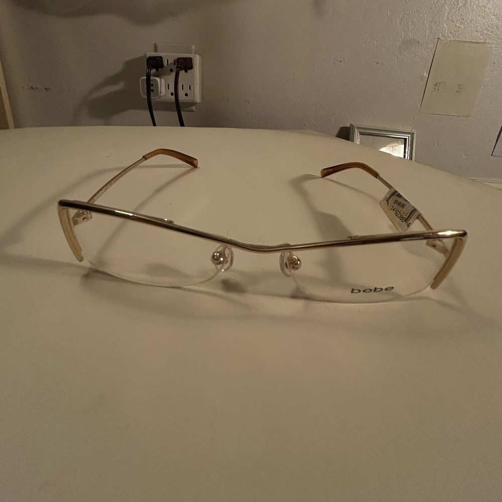 SOLD bebe *siren* half rim eyeglasses